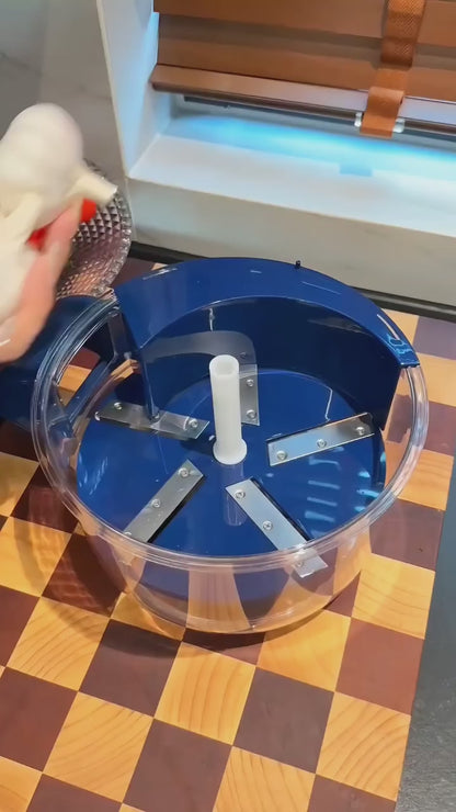 "A close-up demonstration of an automatic electric peeler efficiently peeling a grape in seconds, showing a mess-free and fast kitchen prep process."